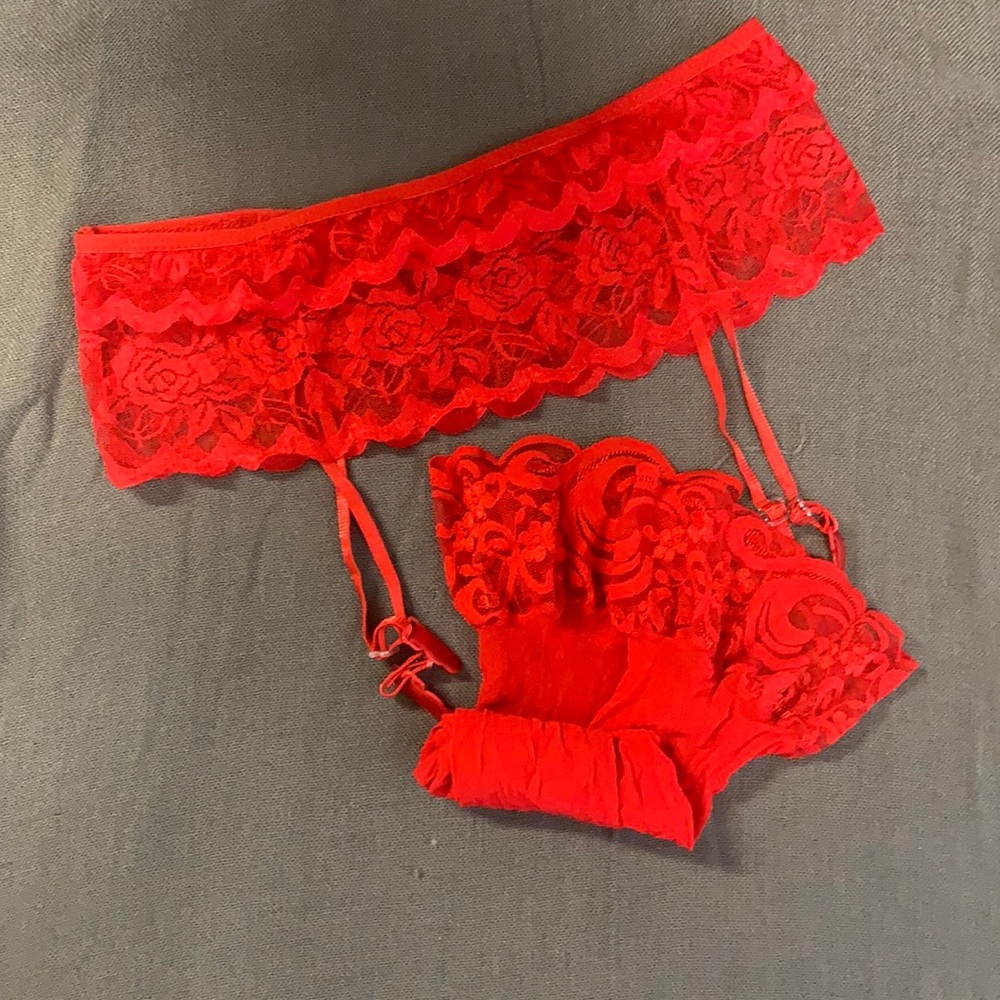 Red garter and coordinating thigh high stockings